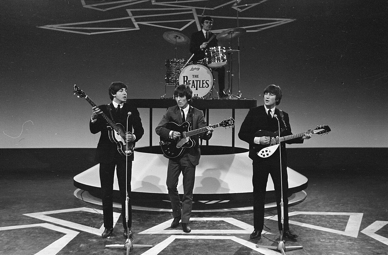 The Beatles performing on tv show