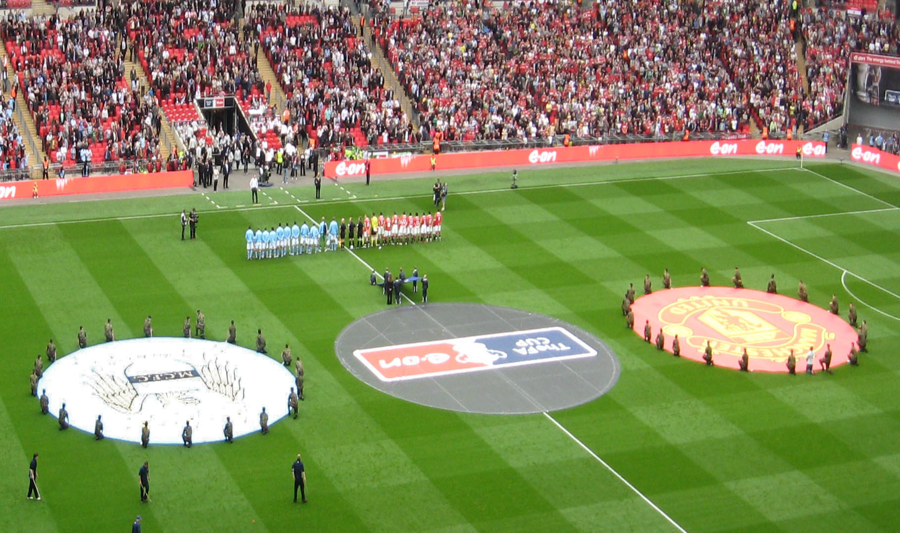 Manchester City F.C. and Manchester United F.C. line up - 2011