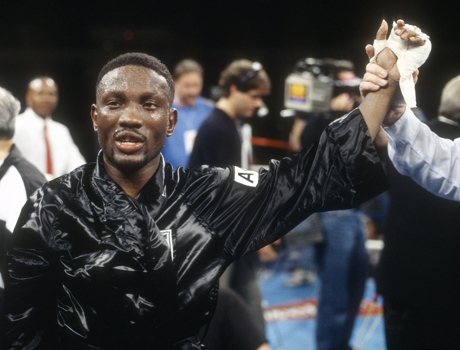 Pernell Whitaker celebrates after he defeated James McGirt for the WBC and Lineal welterweight titles on October 1, 1994