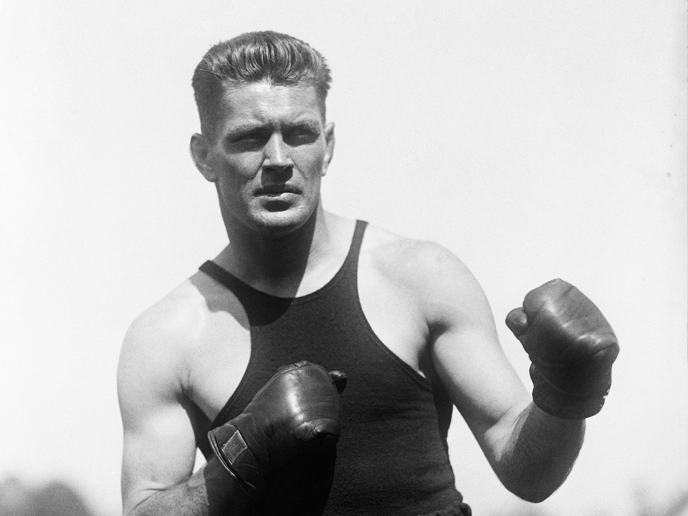 Gene Tunny poses for a portrait while training for his title defense against Tom Heeney on July 24, 1928.