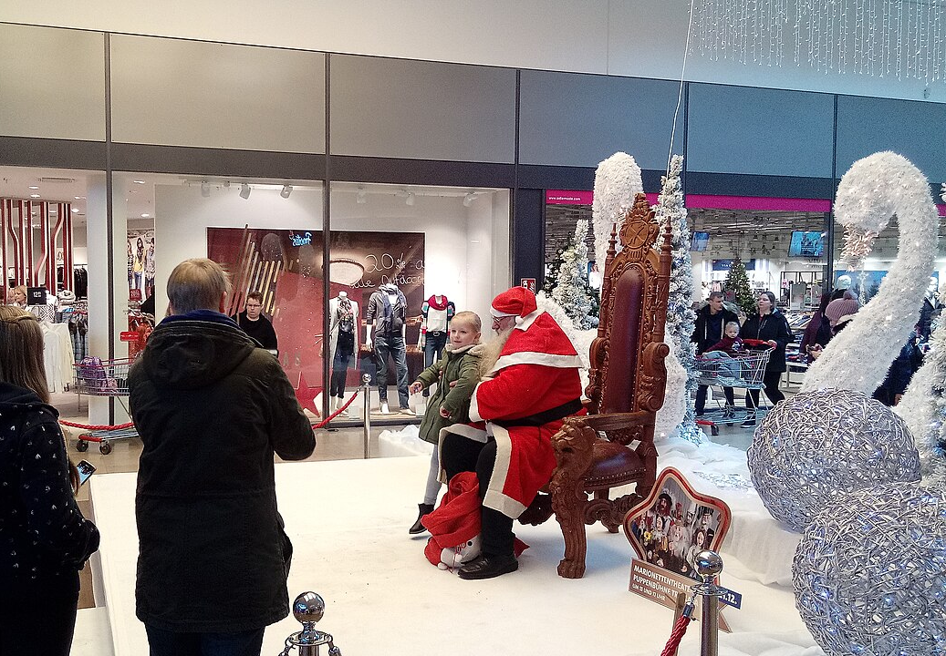 Child near a Mall Santa Claus