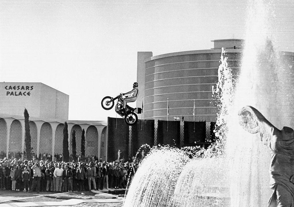 Motorcycle stunt man Evel Knievel jumping over the fountain at Caesars Palace