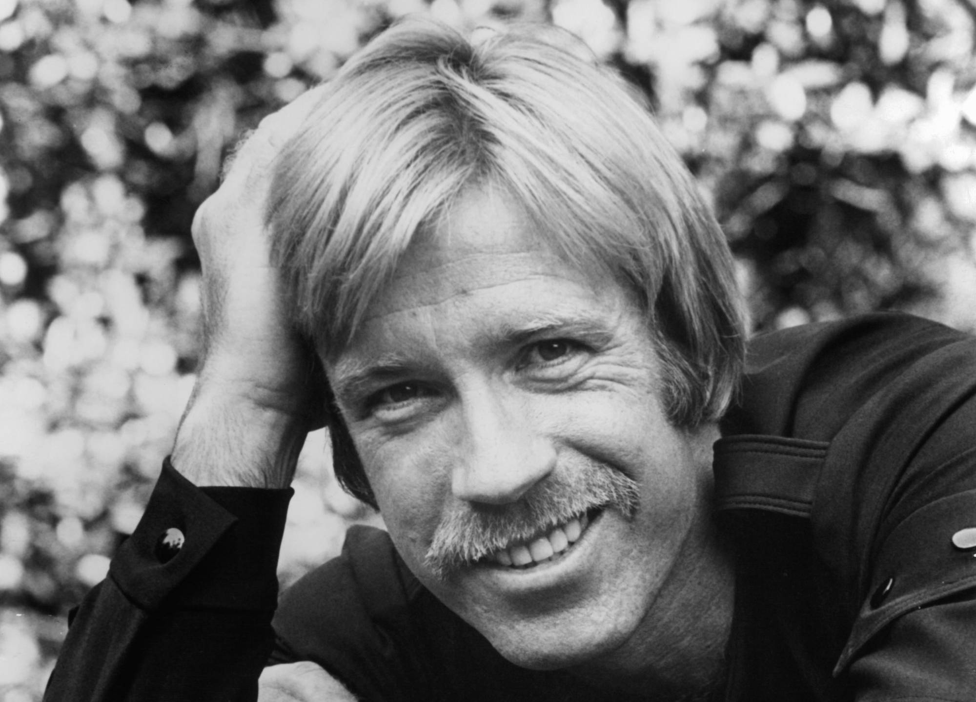 Chuck Norris portrait in black shirt