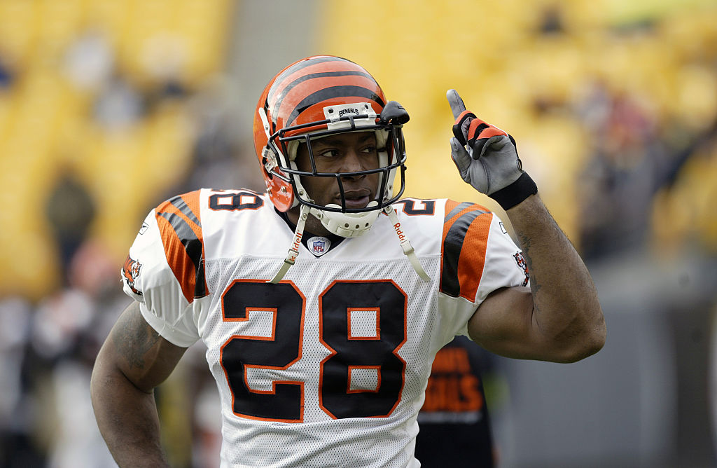 Running back Corey Dillon #28 of the Cincinnati Bengals gestures while on the field before a National Football League game - 2003