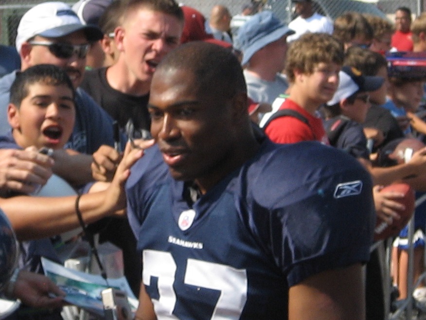Picture of Seahawks players (Shaun Alexander) walking a gauntlet of fans at Eastern Washington University,
