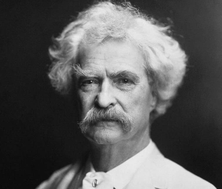 Mark Twain in white suit