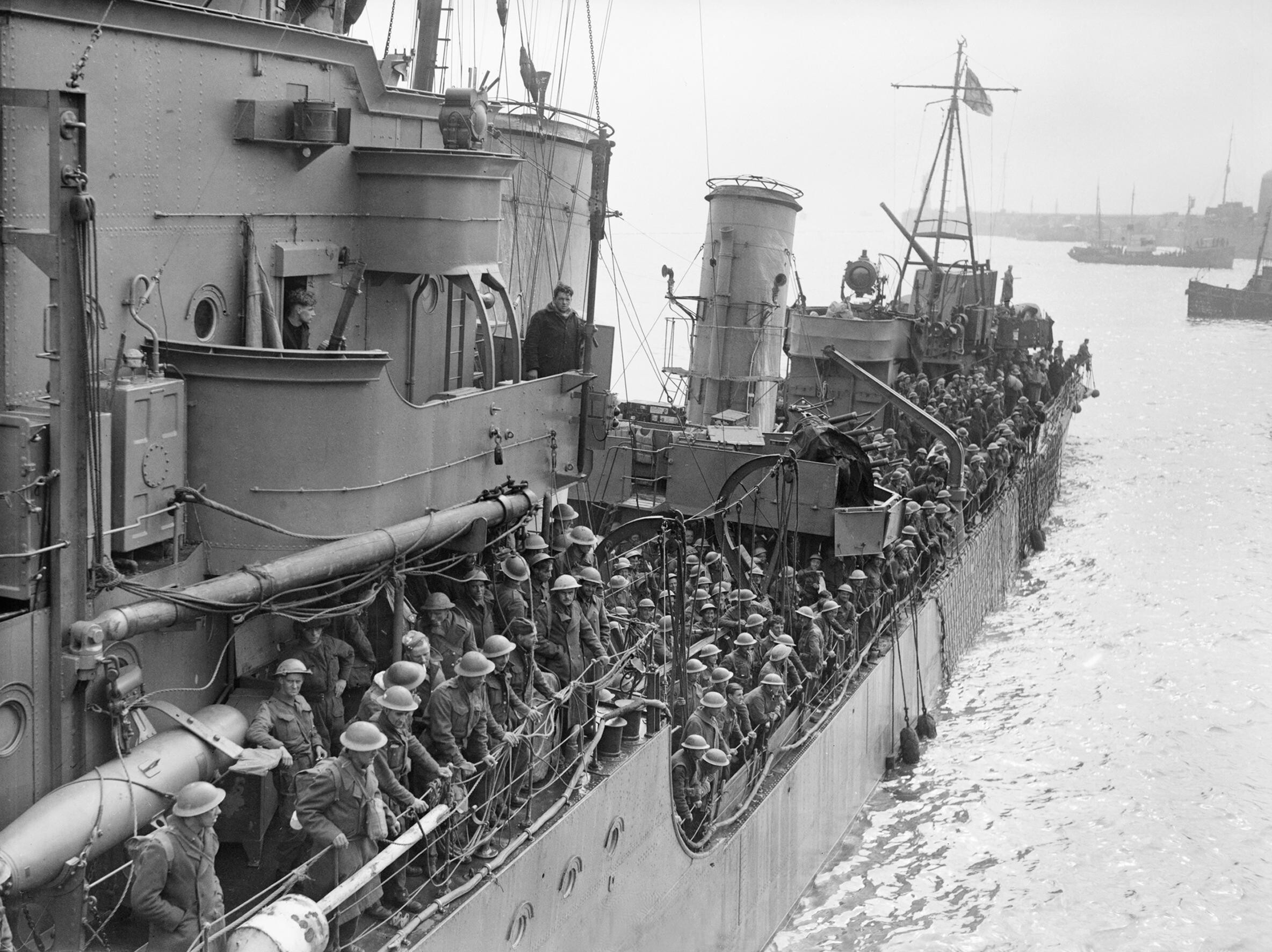 Troops evacuated from Dunkirk on a destroyer about to berth at Dover, 31 May 1940