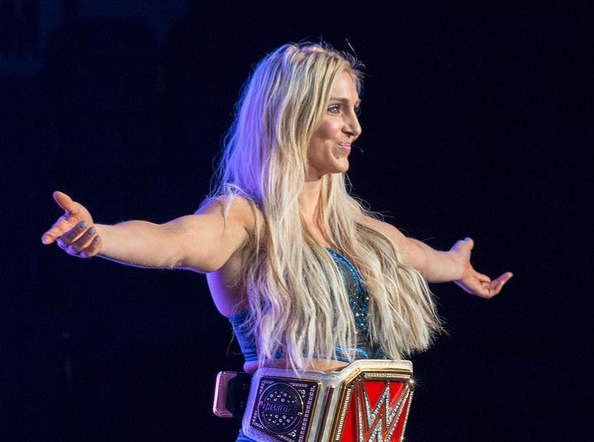 WWE womens champion Charlotte posing with the belt prematch - 2016