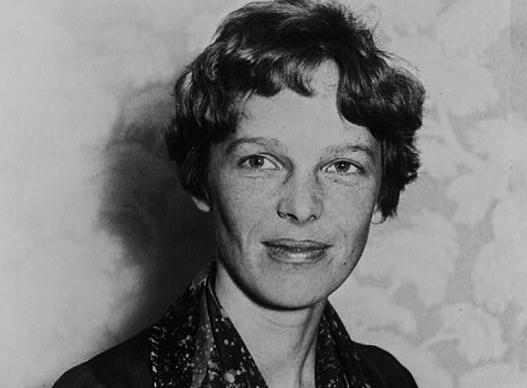Portrait of Amelia Earhart wearing a black top