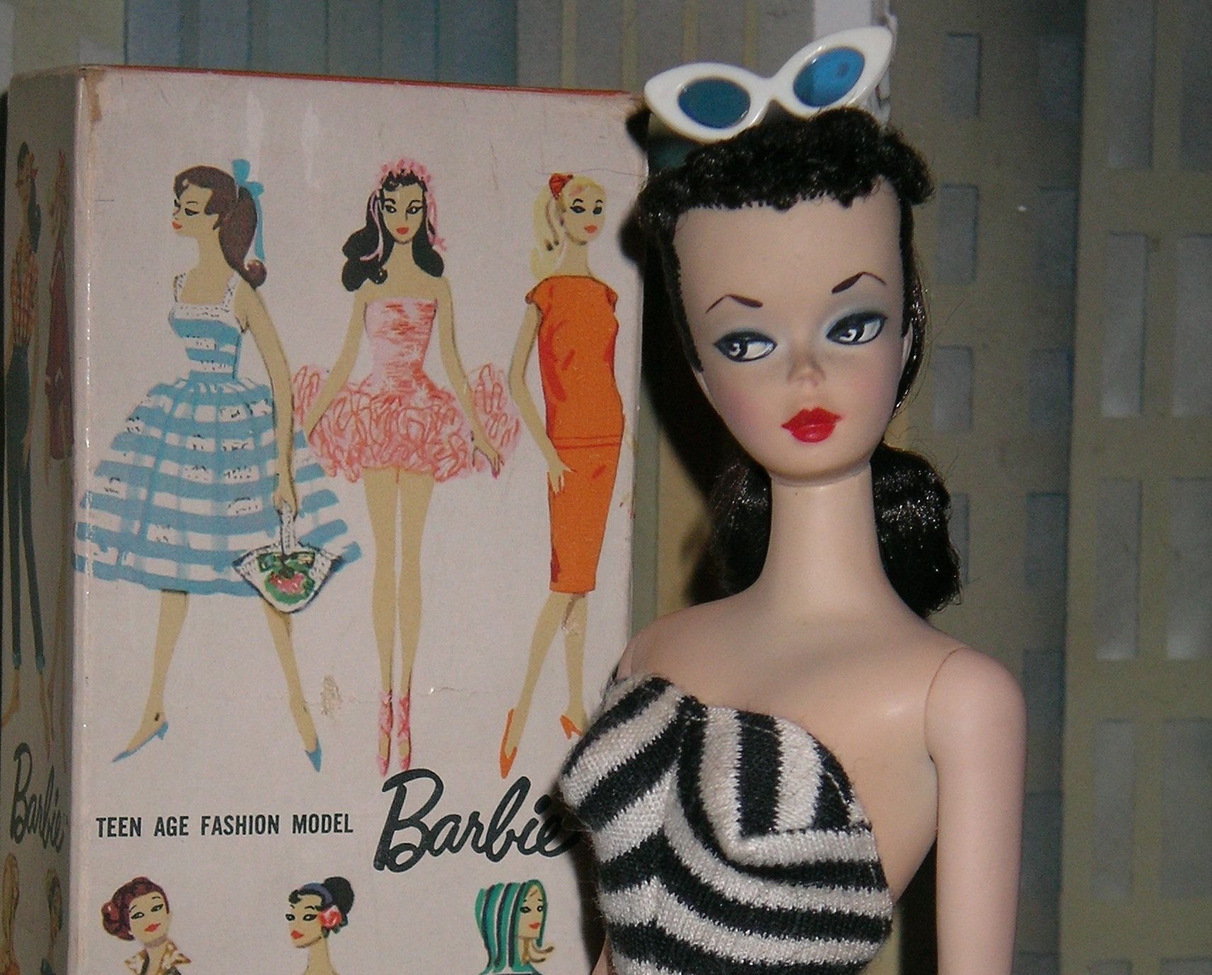 Close Up Photo of The first Barbie doll on a blurred background