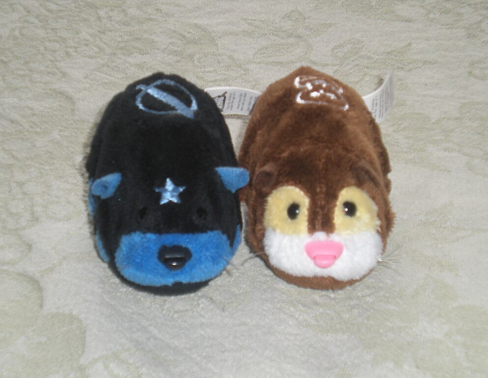 Close Up Photo of A brown and Black Zhu Zhu Pet Hamster