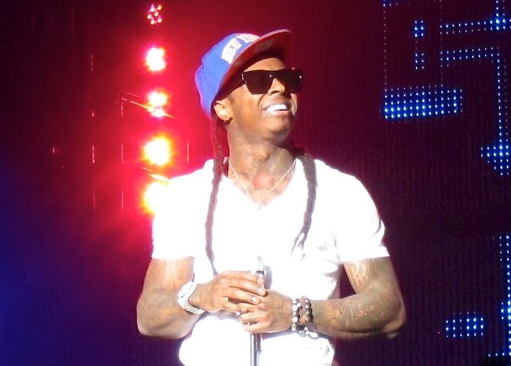 Lil Wayne wearing a white t-shirt