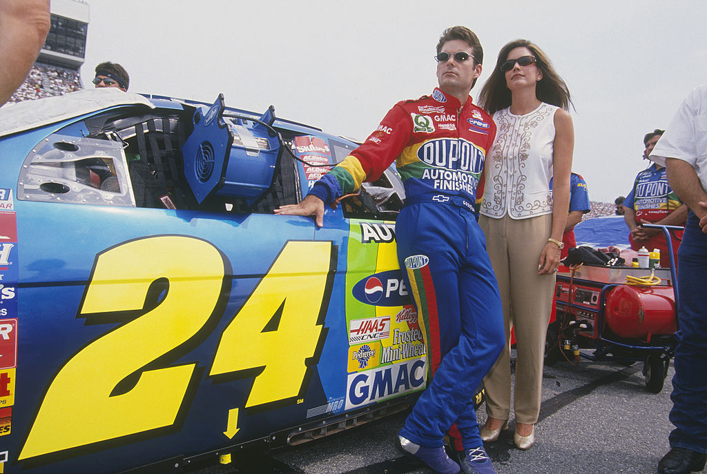 Jeff Gordon stands with his wife, Brooke Gordon, next to the Dupont #24