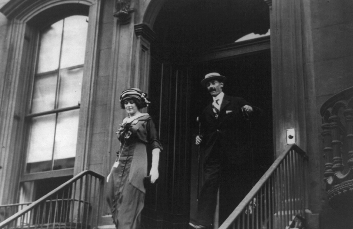 .J. Astor and Miss M.T. Force walking down steps
