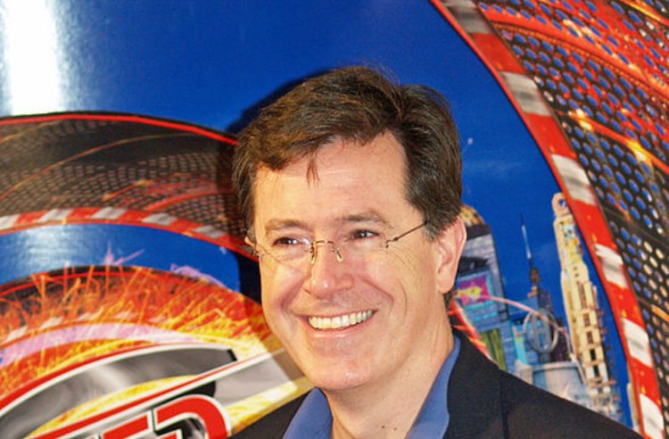 Stephen Colbert wearing a suit