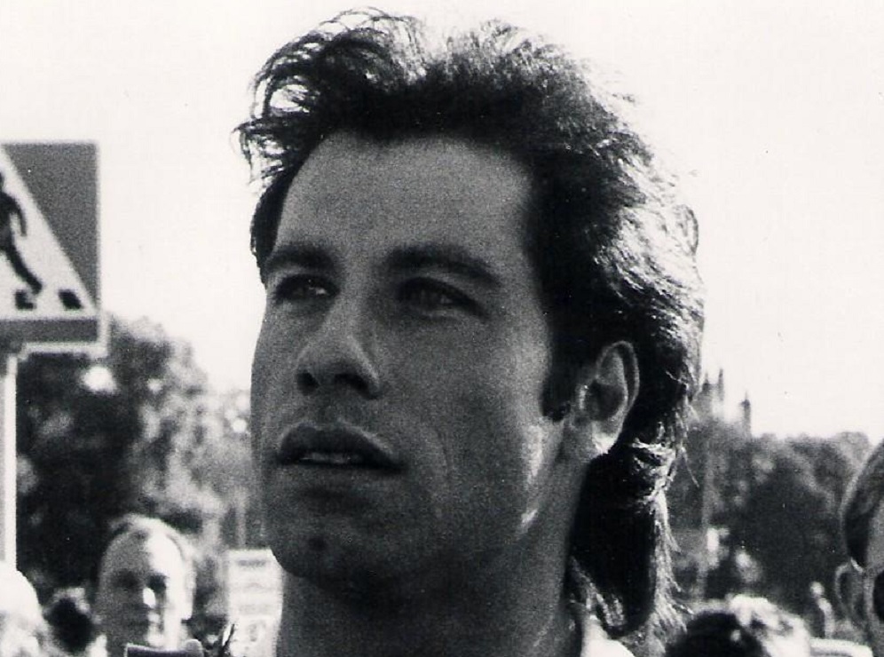 John Travolta looking at side - 1983