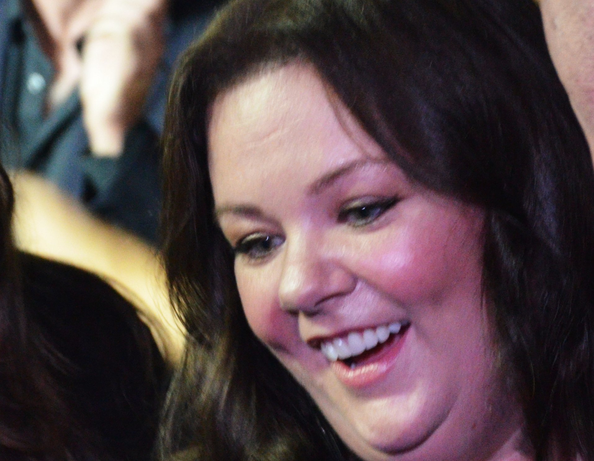 Melissa McCarthy looking away from the camera