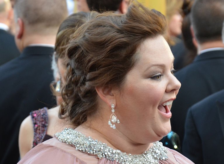 Melissa Mccarthy wearing a pink dress