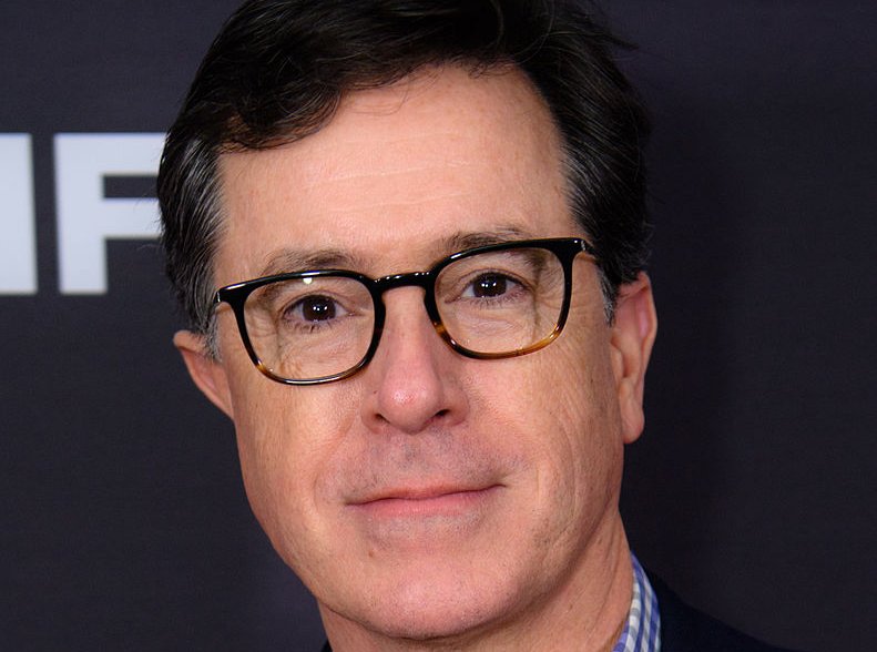 Q&A Moderator Stephen Colbert stops for photos