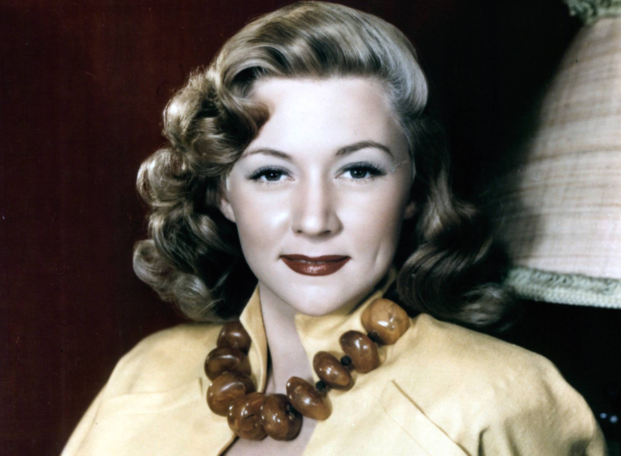 Gloria Grahame, circa 1955 in yellow jacket