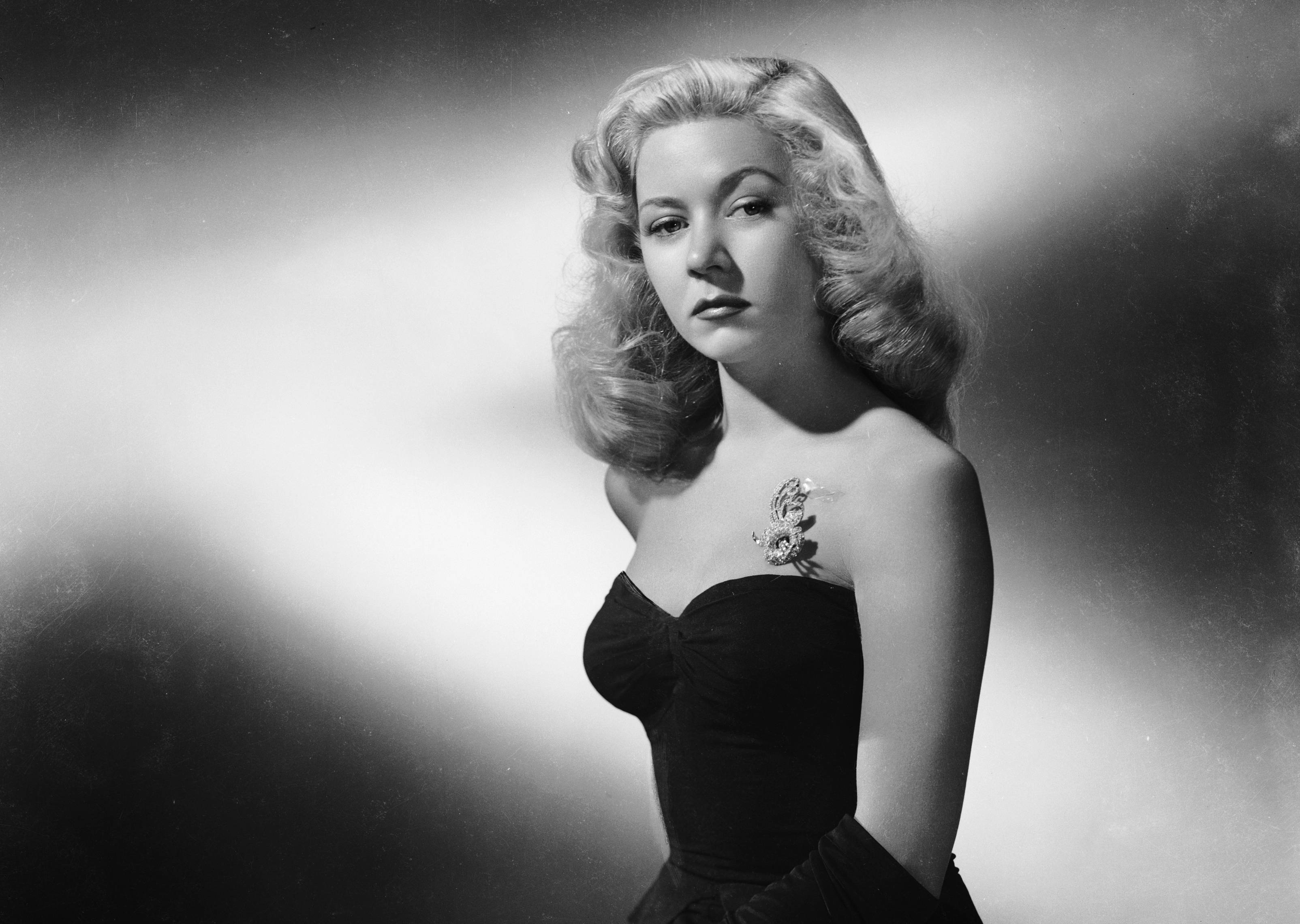 American film star, Gloria Grahame (1923 - 1981) in black dress