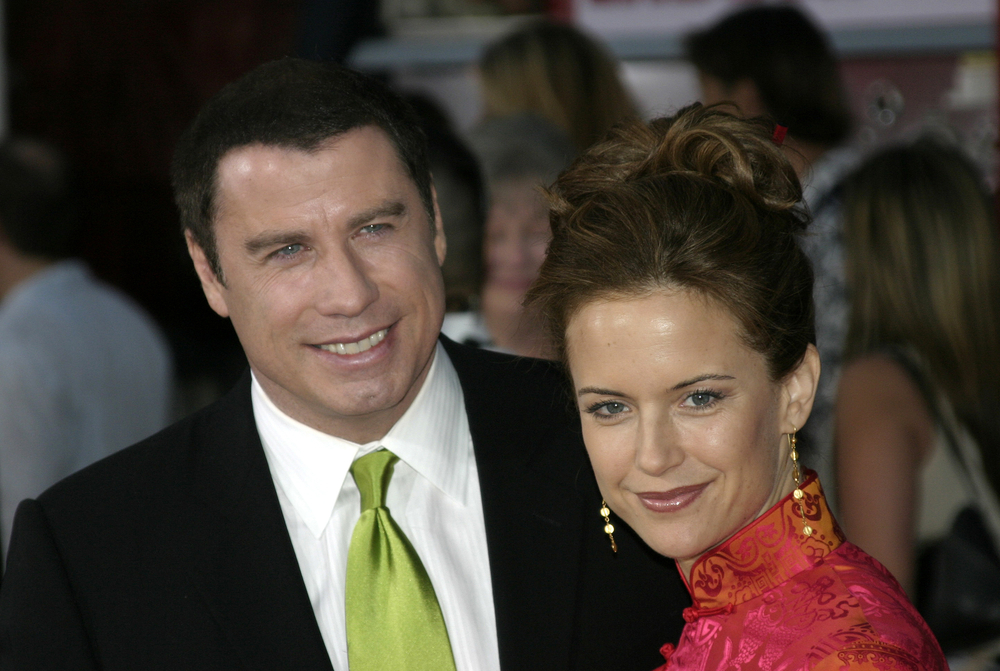 John Travolta and Kelly Preston. World premiere of 'Ladder 49' at the El Capitan Theatre in Hollywood - 2004