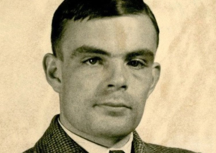 Alan Turing wearing a suit