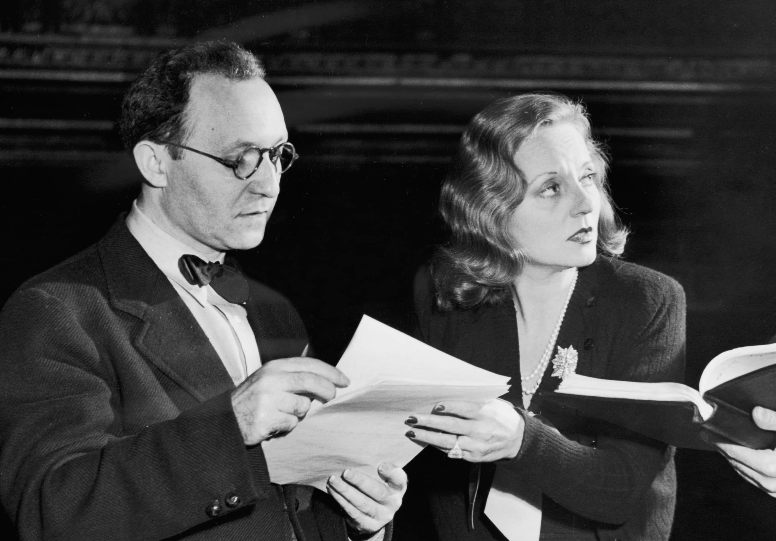 American actress Tallulah Bankhead preparing a role with two directors