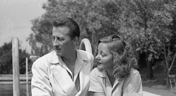 John Emery and Talullah Bankhead Sitting by Pool