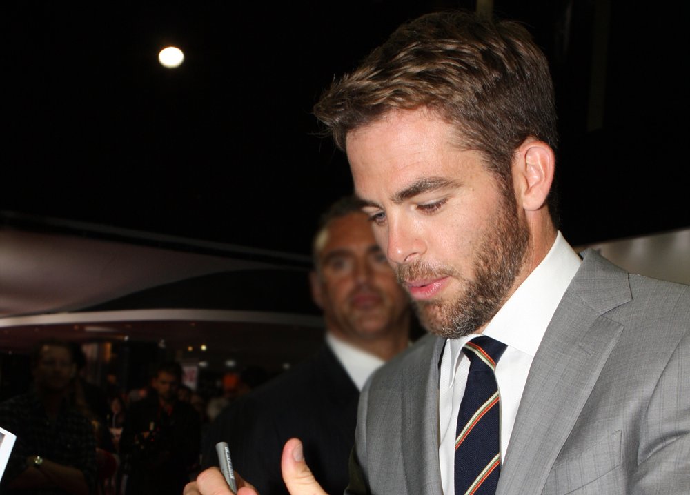 Chris Pine wearing a grey suit