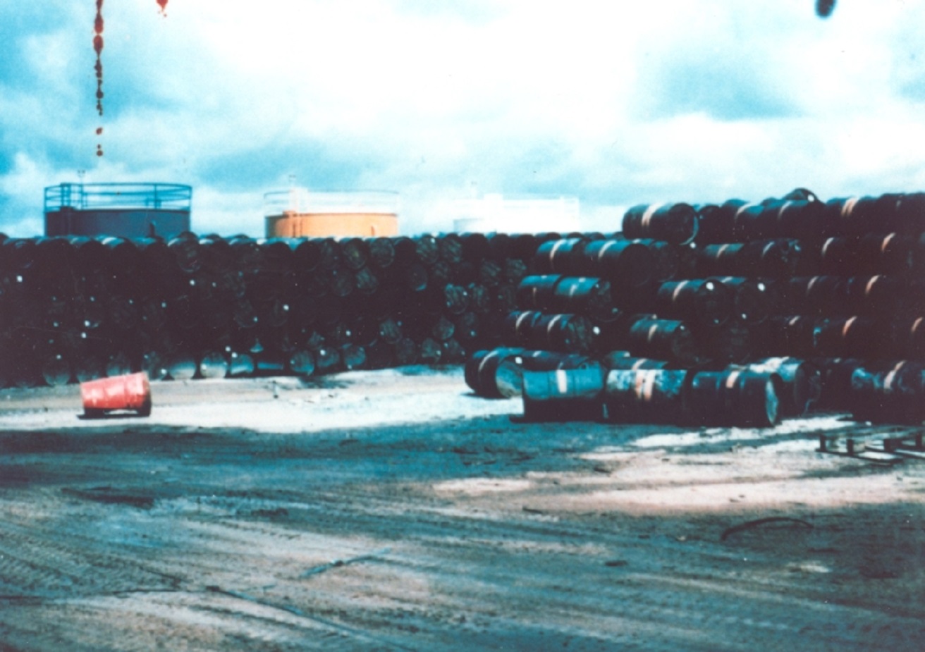Large stacks of 55-gallon drums filled with Agent Orange - 1960s