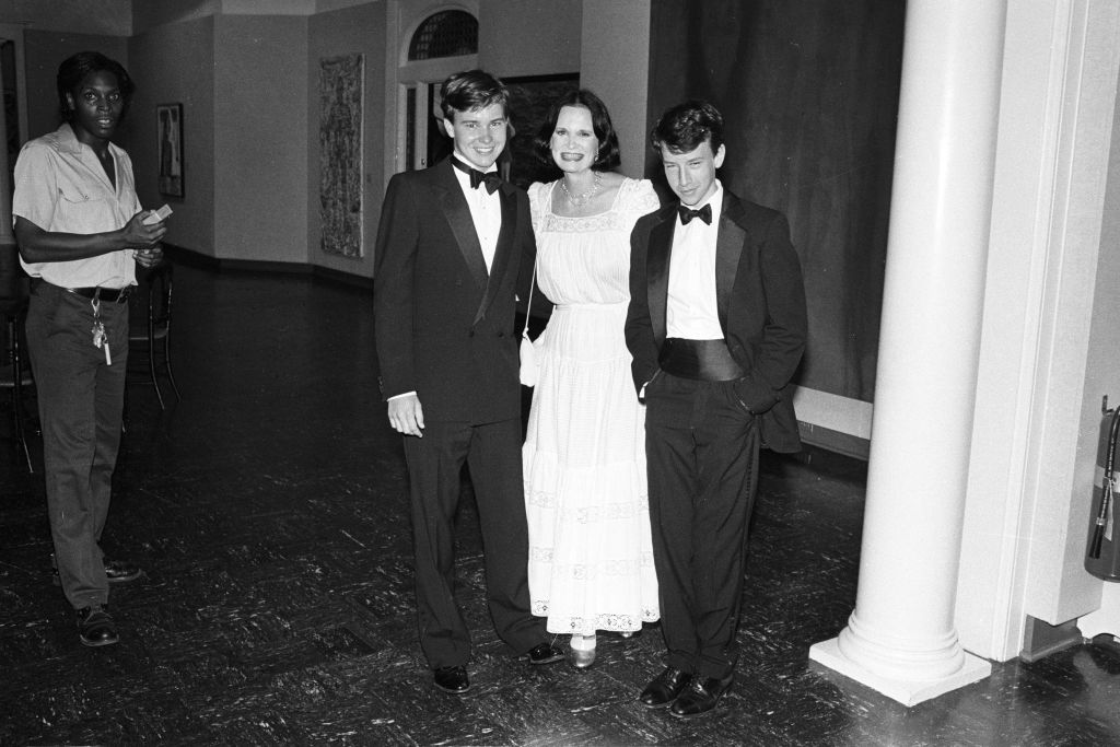 Gloria Vanderbilt with her sons, Carter and Anderson Cooper at an event
