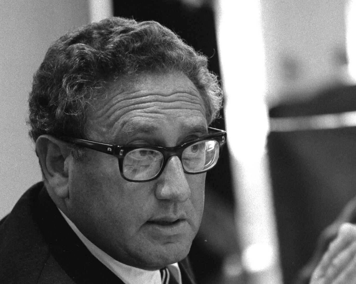 Secretary Of State Henry Kissinger At A Meeting