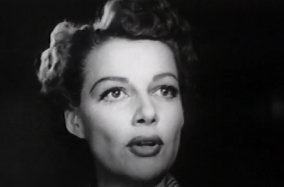 A screenshot from the movie Woman on the Run