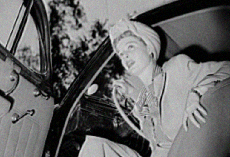 American Actress Ann Sheridan wearing a gabardine suit