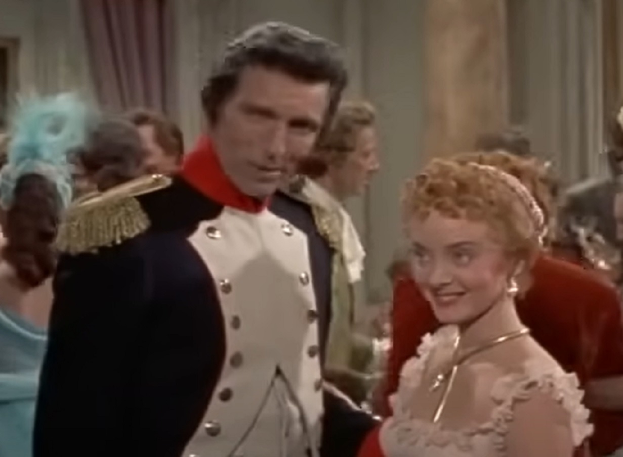 Screenshot of Madame Tallien talking with man - from Désirée (1954)