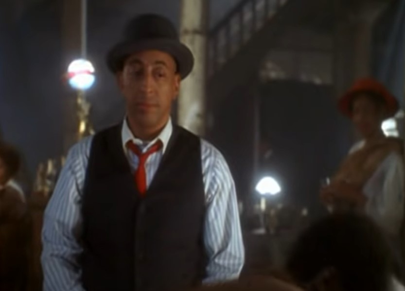 Gregory Hines as Bill Robinson in suit