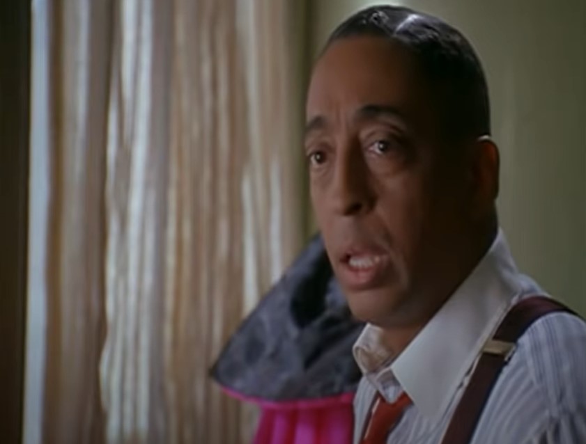 Gregory Hines as Bill Robinson in suit