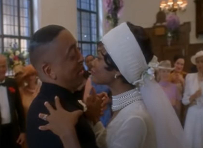 Gregory Hines as Bill Robinson and Kimberly Elise as Fannie
