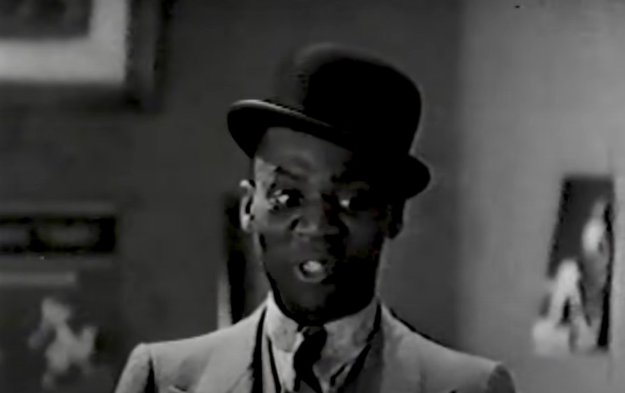 Bill Robinson in Harlem is Heaven dancing