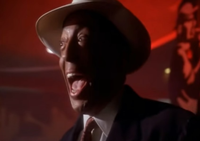 Gregory Hines as Bill Robinson in suit