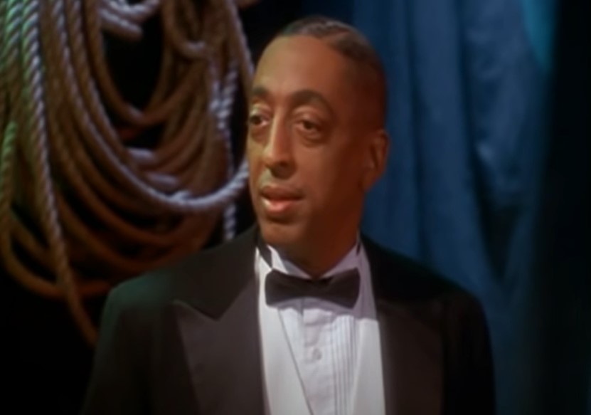 Gregory Hines as Bill Robinson in black suit