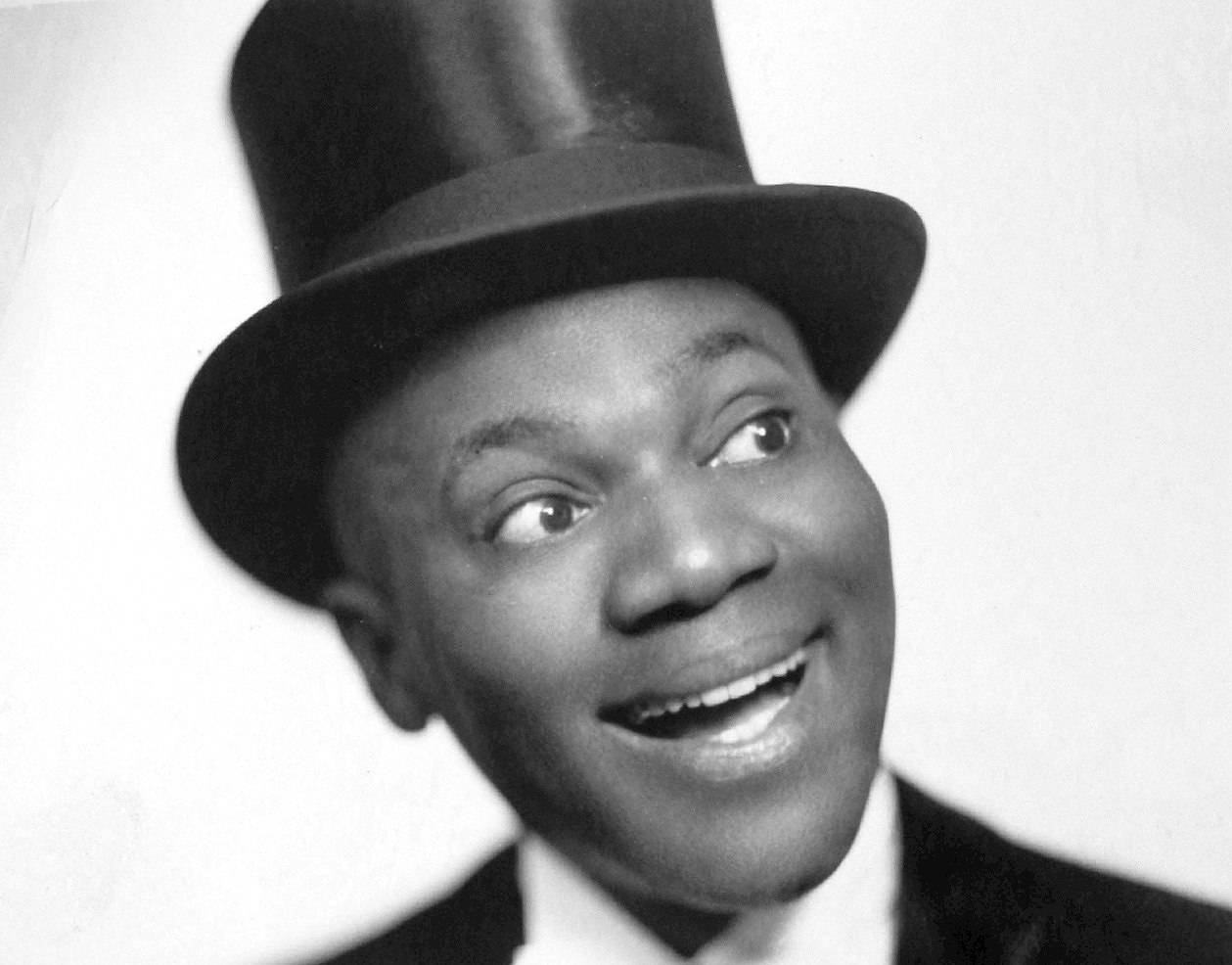 Bill Robinson in suit and hat