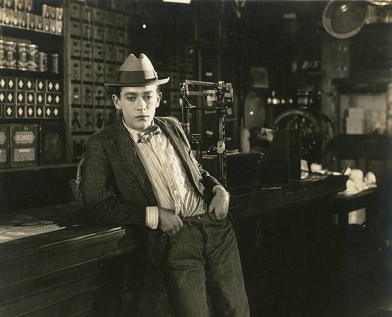 Grayscale Photo of the actor Jack Pickford wearing a dark suit