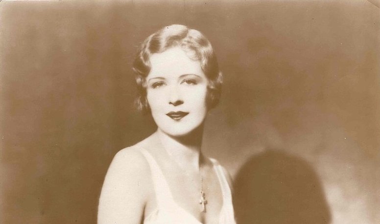 Grayscale Portrait Photo of the actress Marilyn Miller wearing white dress