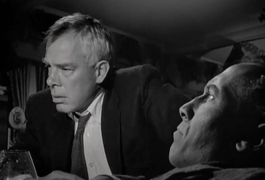 Lee Marvin in Ship of Fools wearing a suit