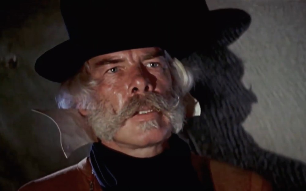 lee marvin in  Paint Your Wagon wearing western clothes and hat