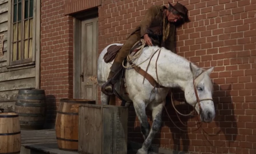 Lee Marvin in Cat Ballou wearing western outfit