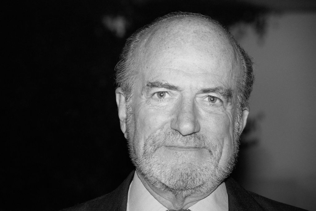 CLAUS VON BULOW in suit looking at the camera