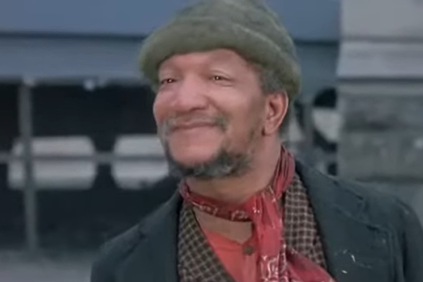 Screenshot of Redd Foxx smiling and looking at side - Cotton Comes To Harlem (1970)